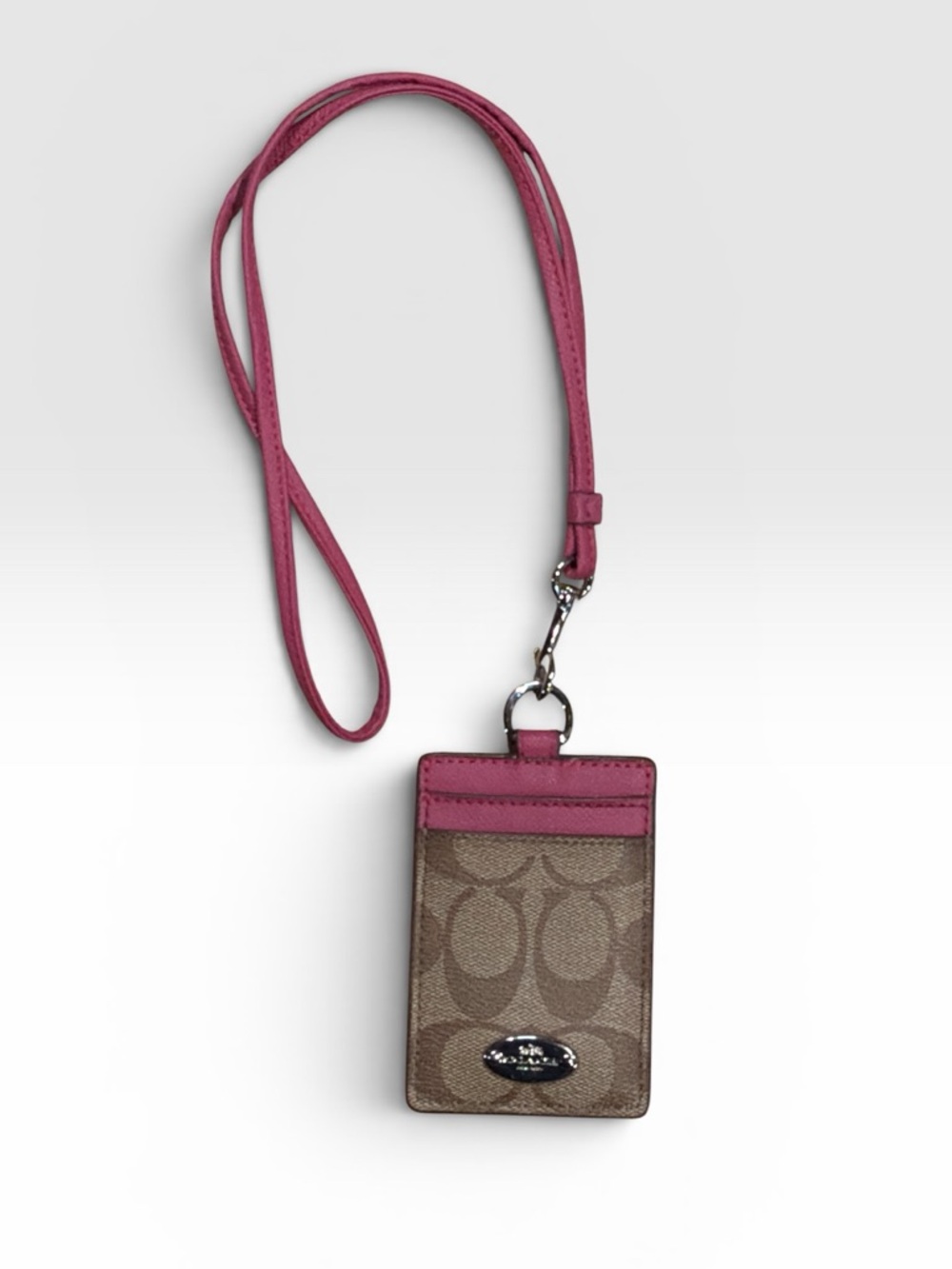 Coach Brown Signature ID Holder with Pink Strap
